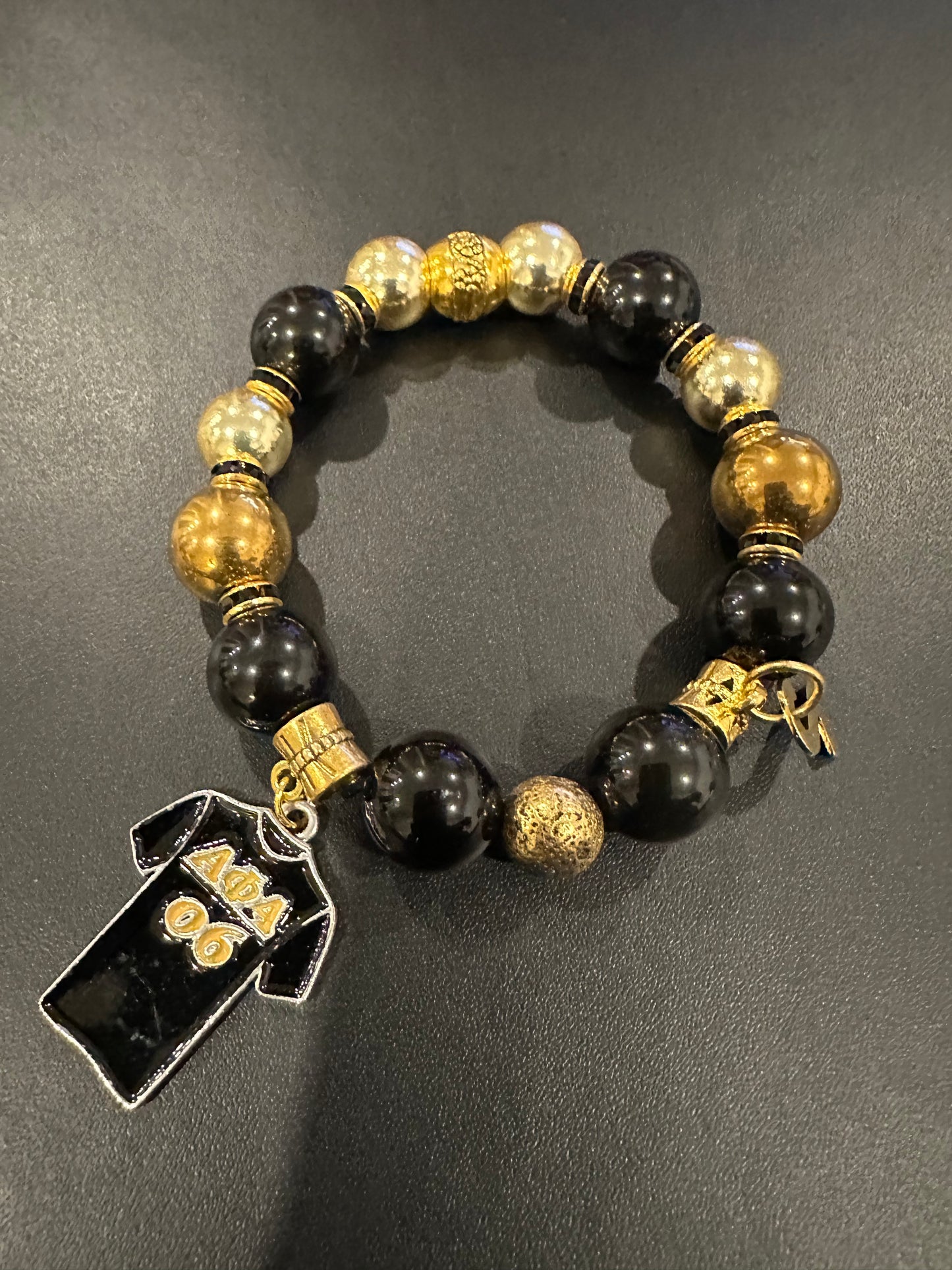 AP004 - Alpha Phi Alpha Charm Bracelet