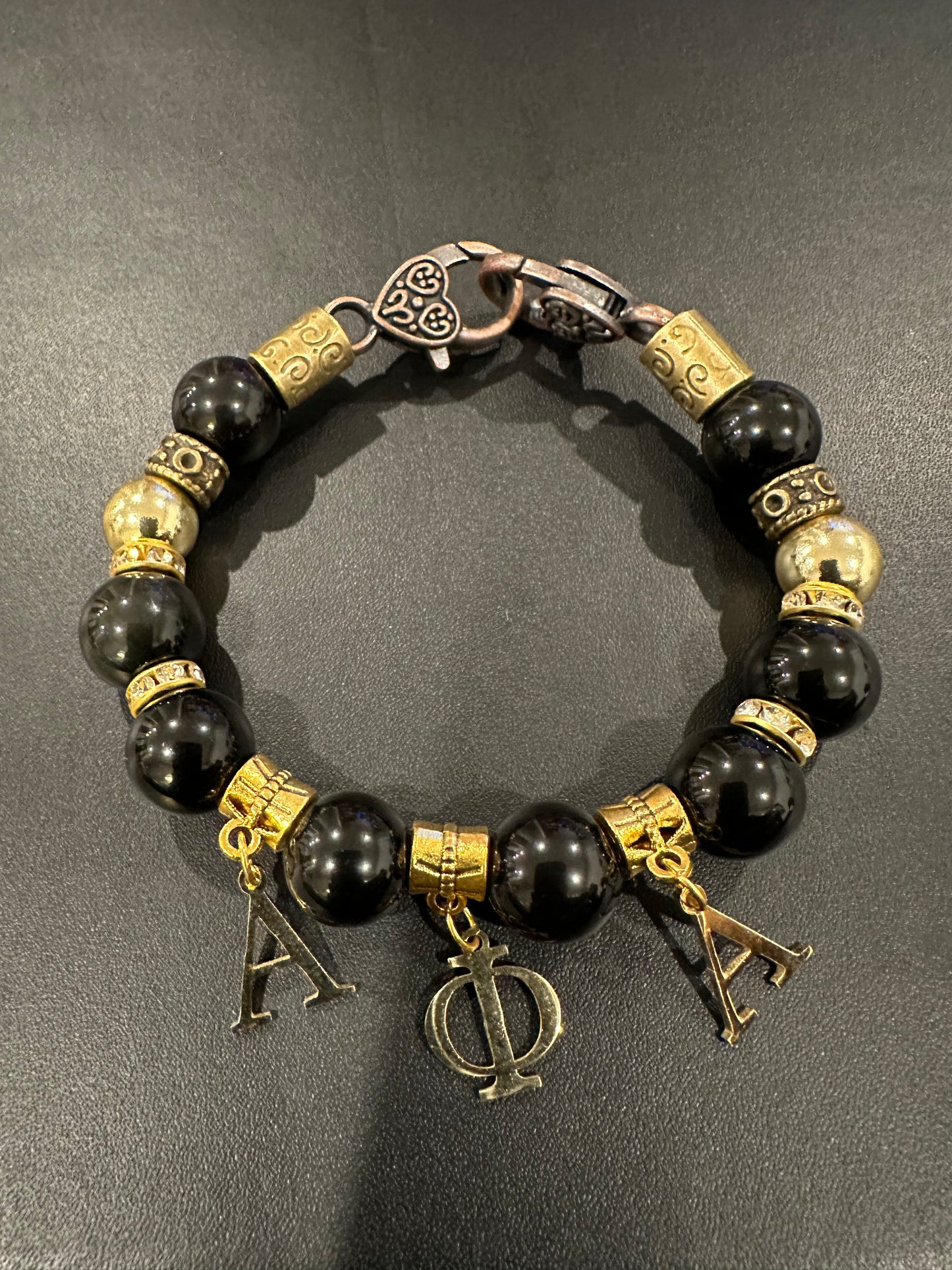 AP013 - Alpha Phi Alpha Charm Bracelet