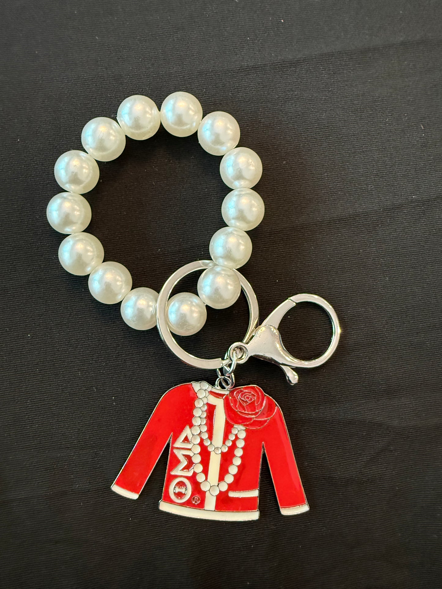 DE099 - Delta Keychain - Pearls and Sweater